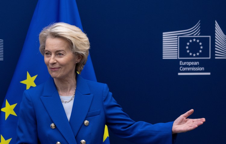 A woman in a blue suit.